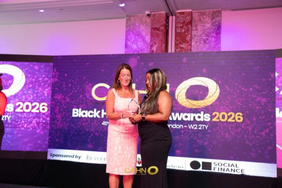 Caroline giving Chantelle her award